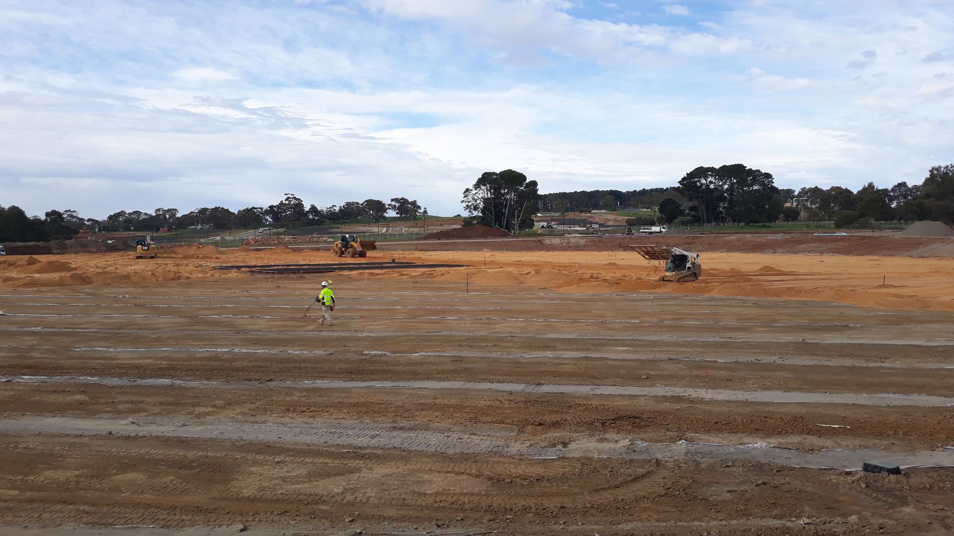 Premier oval preparation placement of turf growing medium, cricket wicket and drainage also visible