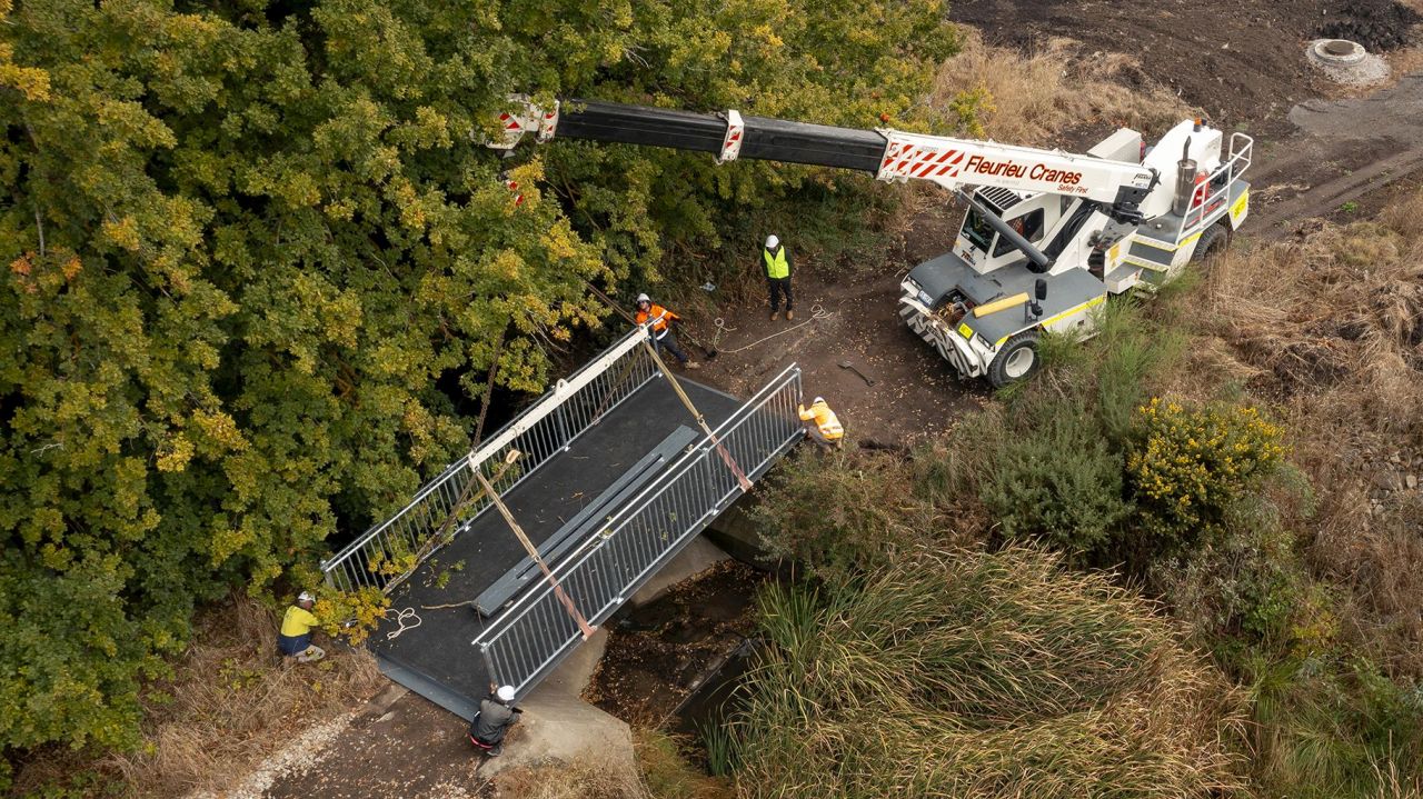 Plastic Bridge being put in place