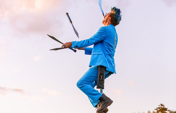 Artist Juggling Knifes